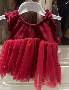 Adorable Red Tulle Dress with Flower Accents
