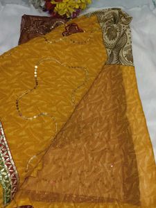 Embellished Brown Net Saree with blouse