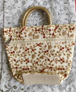 Stunning cream golden coloured handbag