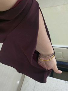 Women's Burgundy Bell Sleeve Dress with cut out.