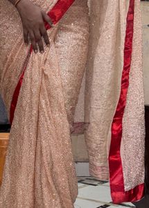 Stunning Sequined Saree with Red Border