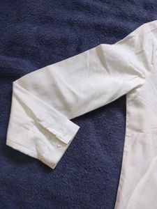 Chic White Button-Up Shirt with Embroidered Detail