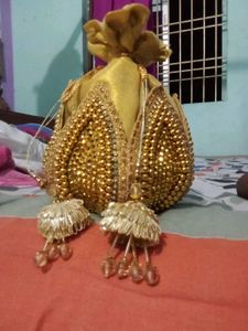 Exquisite Golden Potli Bag