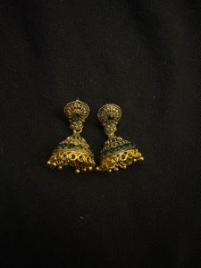 Gold Jhumka Earrings with Green Stones