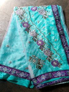 Beautiful Embroidered Teal Saree