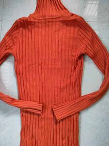 Orange Ribbed Turtleneck Sweater