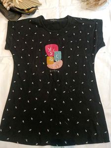 Chic Black T-Shirt with Artistic Detail