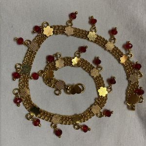 Gold Anklets with Red Beads