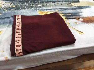 Maroon saree with Embroidered Border