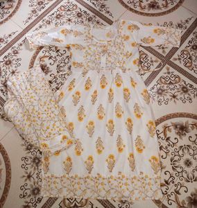 🤍🔥Graceful White & Yellow Cotton Printed Suit Se
