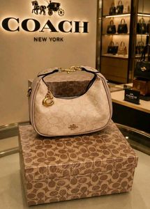 Coach Pink Signature Hobo Bag