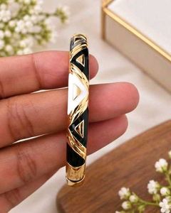 Chic Gold &amp; Black Geometric Bangle