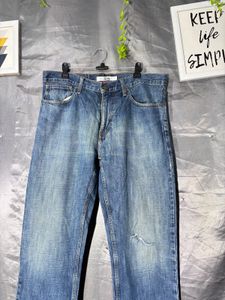 Tommy Hilfiger Men's Blue Distressed Denim Jeans