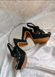 bow platform heels and  black high heel