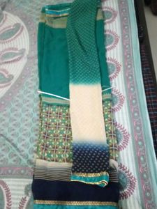 Elegant Teal saree with Intricate Print and unstit