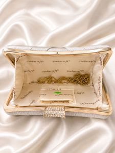 Elegant Silver Clutch Bag with Rhinestone Clasp