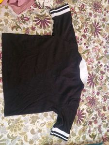 Black Polo Shirt with White Accents
