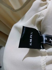 Elegant Sheer Blouse with Bow Detail