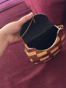 Wood sling bag