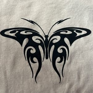 A symmetrical butterfly design crop top