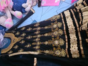 Elegant Black Saree with Gold Border
