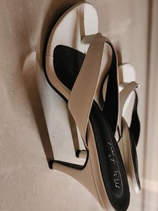 A Pair Of White Heels