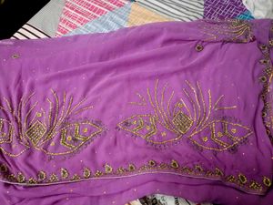 Stunning Purple Embroidered Saree