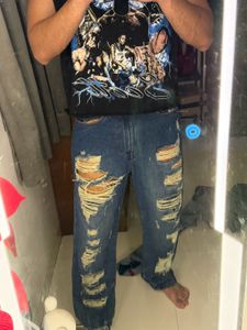 Distressed Blue Denim Jeans