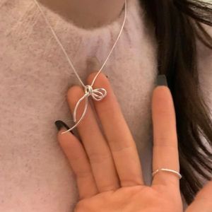 Silver Bow Pendant Necklace