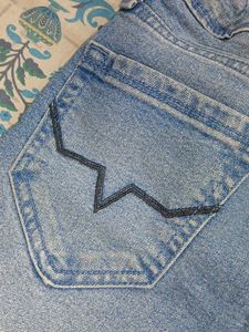Light Wash Distressed Denim Jeans