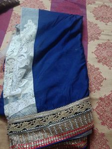 Elegant Blue Saree with White Lace