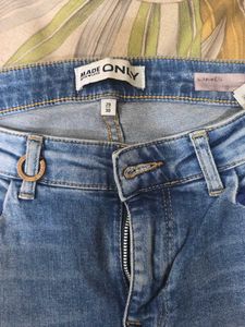 Distressed Blue Denim Jeans