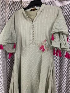 Elegant Light Green Kurti with Pink Tassels