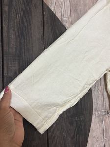 Cream top with Embroidered Patch