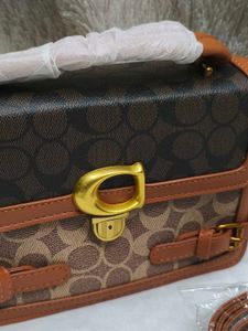 Stylish Coach Handbag Rust 🧡