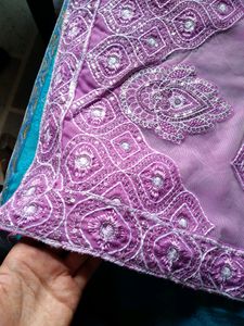 Georgette saree eith blouse..border and design...Pink in colour..