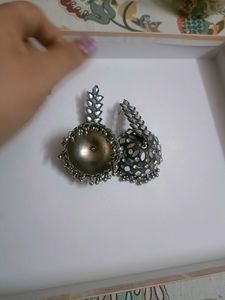 Very Smart Metal Jhumkas With Silver Stones
