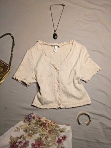 cream crop top lettuce hem