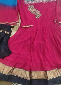 red suit with  black churidar and dupatta