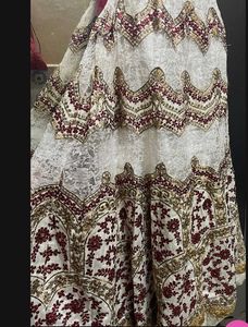 Exquisite off white &amp; Red Lehenga Choli