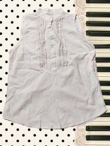 Chic Sleeveless Ruffled Blouse 🍧