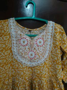 Yellow Printed Kurta with Neck Embellishment