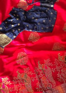 Vibrant Pink Saree with Peacock Motifs