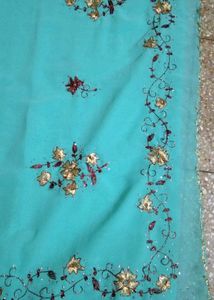 Elegant Turquoise Embroidered Saree