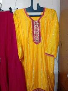 yellow and pink heavy sharara suit with