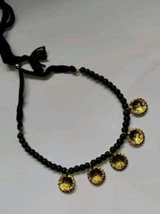 Black Beaded Necklace with Gold Pendants