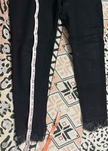 Stylish Black Lace Hem Jeans