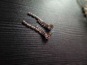 Chic Dangle Earrings with Purple Accents