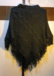 Cozy Knitted Poncho with Fringe