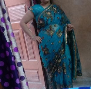 heavy trendy Embroidery Work net saree